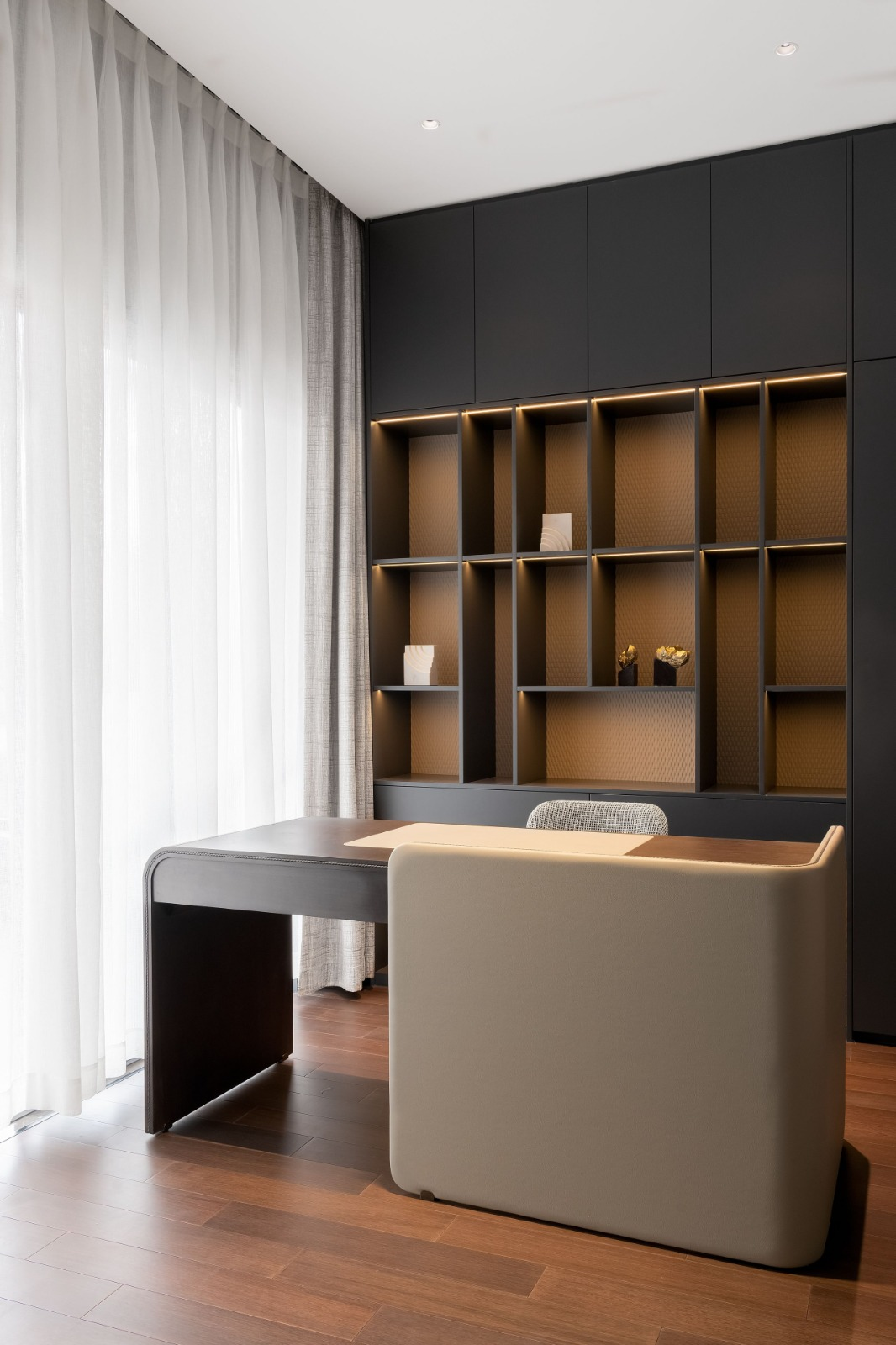 Home office with built-in shelving